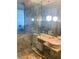 Modern bathroom with marble vanity and glass enclosed shower at 4381 W Flamingo Rd # 8304, Las Vegas, NV 89103