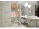 Spa-like bathroom with marble finishes and glass shower at 4381 W Flamingo Rd # 8304, Las Vegas, NV 89103