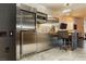 Sleek stainless steel kitchen, built-in microwave, and marble tile floor at 4381 W Flamingo Rd # 8304, Las Vegas, NV 89103