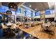 Elegant dining area with large windows and modern lighting fixtures at 4381 W Flamingo Rd # 8304, Las Vegas, NV 89103