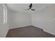 Spacious bedroom with carpet, ceiling fan, and double door closet at 4506 Alpine Pl, Las Vegas, NV 89107