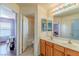 Double vanity bathroom with adjacent toilet and shower at 5373 Sleeping Cat St, Las Vegas, NV 89122
