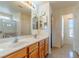 Double vanity bathroom with access to closet and shower at 5373 Sleeping Cat St, Las Vegas, NV 89122