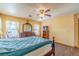 Primary bedroom with dresser and large bed at 5373 Sleeping Cat St, Las Vegas, NV 89122