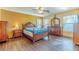Spacious bedroom with hardwood floors and wood furniture at 5373 Sleeping Cat St, Las Vegas, NV 89122