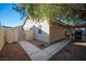 Side yard access with concrete pathway and gate at 572 Decidedly St, Henderson, NV 89015