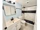 Updated bathroom with a walk-in shower and modern vanity at 601 Cabrillo Cir # 1293, Henderson, NV 89015