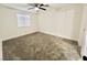 Spacious bedroom with ceiling fan and gray carpeting at 601 Cabrillo Cir # 1293, Henderson, NV 89015