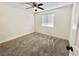 Spacious bedroom with ceiling fan and gray carpet at 601 Cabrillo Cir # 1293, Henderson, NV 89015