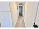 Clean and bright hallway with wood-look flooring at 601 Cabrillo Cir # 1293, Henderson, NV 89015