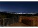 Enjoy spectacular city views from this balcony with a stone facade and a beautiful flower box at night at 641 Saint Croix St, Henderson, NV 89012