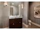 Stylish powder room features a marble countertop and unique textured wallpaper, adding elegance at 641 Saint Croix St, Henderson, NV 89012