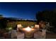 Inviting fire pit area with comfortable seating and city views at 641 Saint Croix St, Henderson, NV 89012
