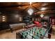 Large game room with foosball, an air hockey table, a poker table, and a large screen at 641 Saint Croix St, Henderson, NV 89012