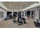 Spacious home gym with weight machines, treadmill, and views of outdoor area at 641 Saint Croix St, Henderson, NV 89012