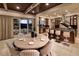 Bright, open kitchen boasts granite countertops, stainless steel appliances, and island seating at 641 Saint Croix St, Henderson, NV 89012