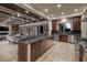Gourmet kitchen with center island, modern appliances, and open to living area at 641 Saint Croix St, Henderson, NV 89012