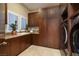 Functional laundry room with ample cabinet space and modern washer and dryer units at 641 Saint Croix St, Henderson, NV 89012