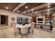Open concept living area with coffered wood ceilings, fireplace, and sleek modern decor at 641 Saint Croix St, Henderson, NV 89012