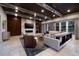 Stately living room featuring dark wood trim, designer furniture, and views of the outdoor scenery at 641 Saint Croix St, Henderson, NV 89012