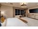 Bedroom boasts soft lighting, cityscape view, a king bed and refined contemporary decor for relaxed elegance at 641 Saint Croix St, Henderson, NV 89012