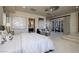 This bright main bedroom features a sitting area, ensuite bathroom, and outdoor access at 641 Saint Croix St, Henderson, NV 89012