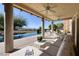 The expansive patio with an infinity pool has comfortable seating and stunning views, perfect for outdoor living at 641 Saint Croix St, Henderson, NV 89012