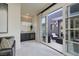This room features a marble counter with mini fridge and access to a peaceful outdoor patio at 641 Saint Croix St, Henderson, NV 89012