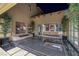 Modern water feature with a sitting area, seamlessly blending indoor and outdoor living at 641 Saint Croix St, Henderson, NV 89012