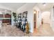 Bright hallway showcases modern decor, leading to the kitchen and other areas of this inviting home at 664 Orchard Course Dr, Las Vegas, NV 89148