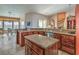 Gourmet kitchen boasts granite countertops and dark wood cabinetry at 741 Antelope Ave, Pahrump, NV 89060