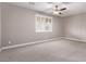 Bright bedroom with plantation shutters and neutral decor at 8797 Pinley Spring St, Las Vegas, NV 89113