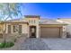 Single story home with two-car garage and landscaped front yard at 8797 Pinley Spring St, Las Vegas, NV 89113