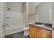 Clean bathroom with granite countertop and shower/tub combo at 8805 Jeffreys St # 1115, Las Vegas, NV 89123