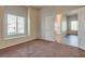 Bright bedroom with large window, and door to hallway at 8805 Jeffreys St # 1115, Las Vegas, NV 89123