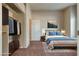 Virtually staged bedroom with a large closet and comfortable bed at 8805 Jeffreys St # 1115, Las Vegas, NV 89123