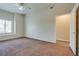 Large bedroom with ceiling fan and access to bathroom and closet at 8805 Jeffreys St # 1115, Las Vegas, NV 89123