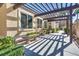 Covered seating area with pergola and benches at 8805 Jeffreys St # 1115, Las Vegas, NV 89123
