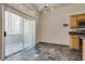 Dining area with slate tile flooring and access to a balcony at 8805 Jeffreys St # 1115, Las Vegas, NV 89123