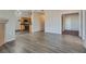 Open concept living room with hardwood floors and kitchen access at 8805 Jeffreys St # 1115, Las Vegas, NV 89123