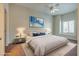 Spacious bedroom with natural light, a ceiling fan, and a large window with a window seat at 8805 Jeffreys St # 1115, Las Vegas, NV 89123