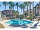 Community pool area with ample seating at 8805 Jeffreys St # 1115, Las Vegas, NV 89123