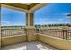 Serene balcony view capturing a well-manicured golf course and distant mountain range at 9133 Las Manaitas Ave # 302, Las Vegas, NV 89144