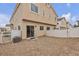 Backyard of the home has a white fence and gravel ground cover at 9323 Leaping Deer Pl # 102, Las Vegas, NV 89178