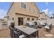 Cozy backyard patio with dining and lounging area, perfect for outdoor entertaining at 9323 Leaping Deer Pl # 102, Las Vegas, NV 89178