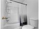 Bathroom showcasing a shower-tub combo and modern fixtures at 9323 Leaping Deer Pl # 102, Las Vegas, NV 89178