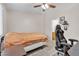 A bedroom featuring a desk workspace, an accent shelf, and neutral tones for a relaxing, adaptable space at 9323 Leaping Deer Pl # 102, Las Vegas, NV 89178