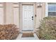 Front door with house number 102 and mat that reads 