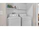 Laundry area with modern washer and dryer units for convenient chores at 9323 Leaping Deer Pl # 102, Las Vegas, NV 89178