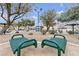 Community fitness area offering exercise equipment and seating areas with drought tolerant landscaping at 9323 Leaping Deer Pl # 102, Las Vegas, NV 89178